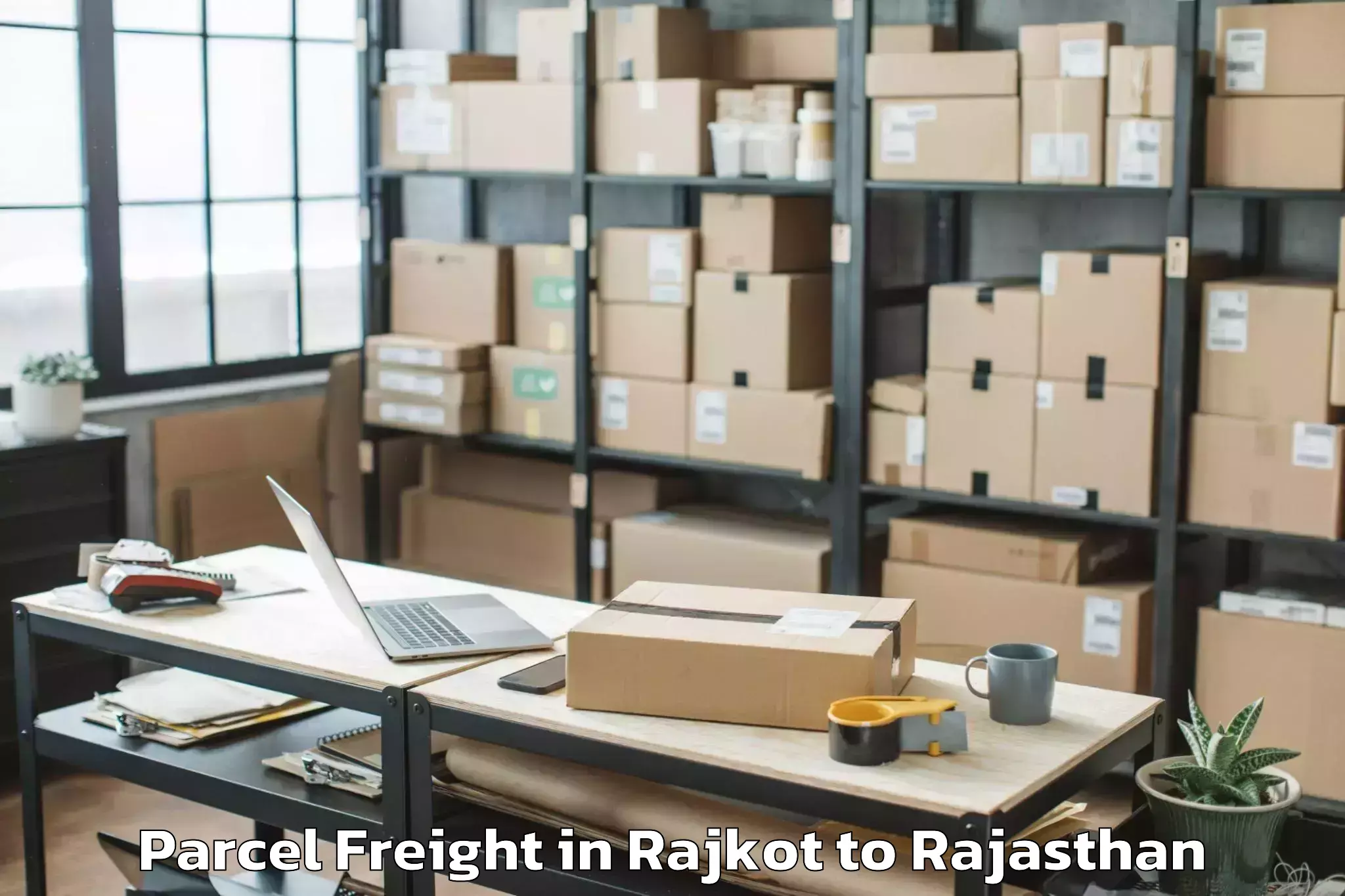 Affordable Rajkot to Karauli Parcel Freight